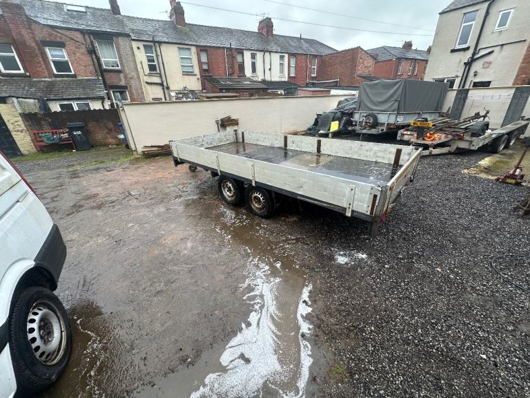 Drop side traihh trailer