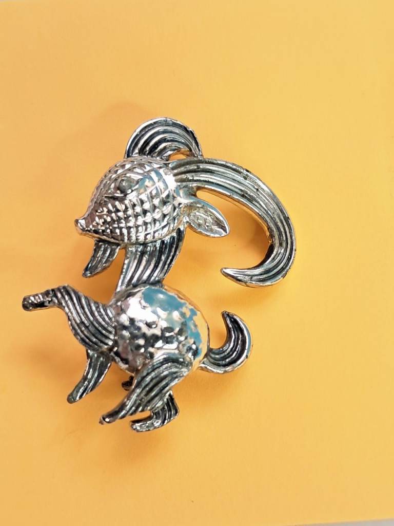 Vintage Mexican silver tone Capricorn zodiac brooch.