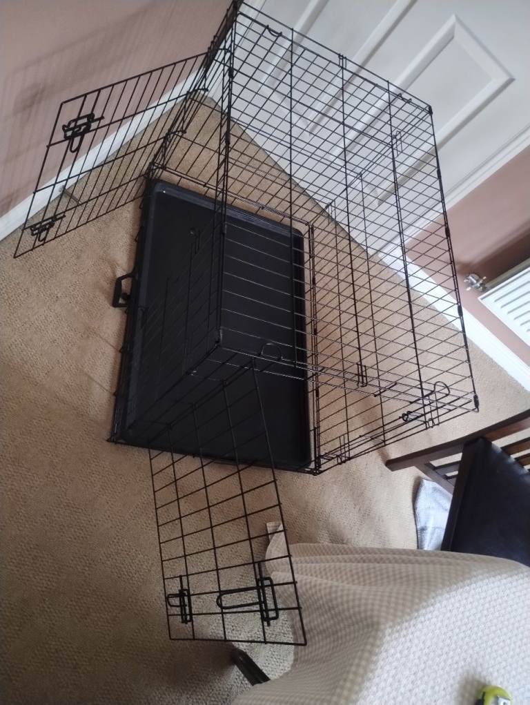Heavy Duty dog cage. Almost new.