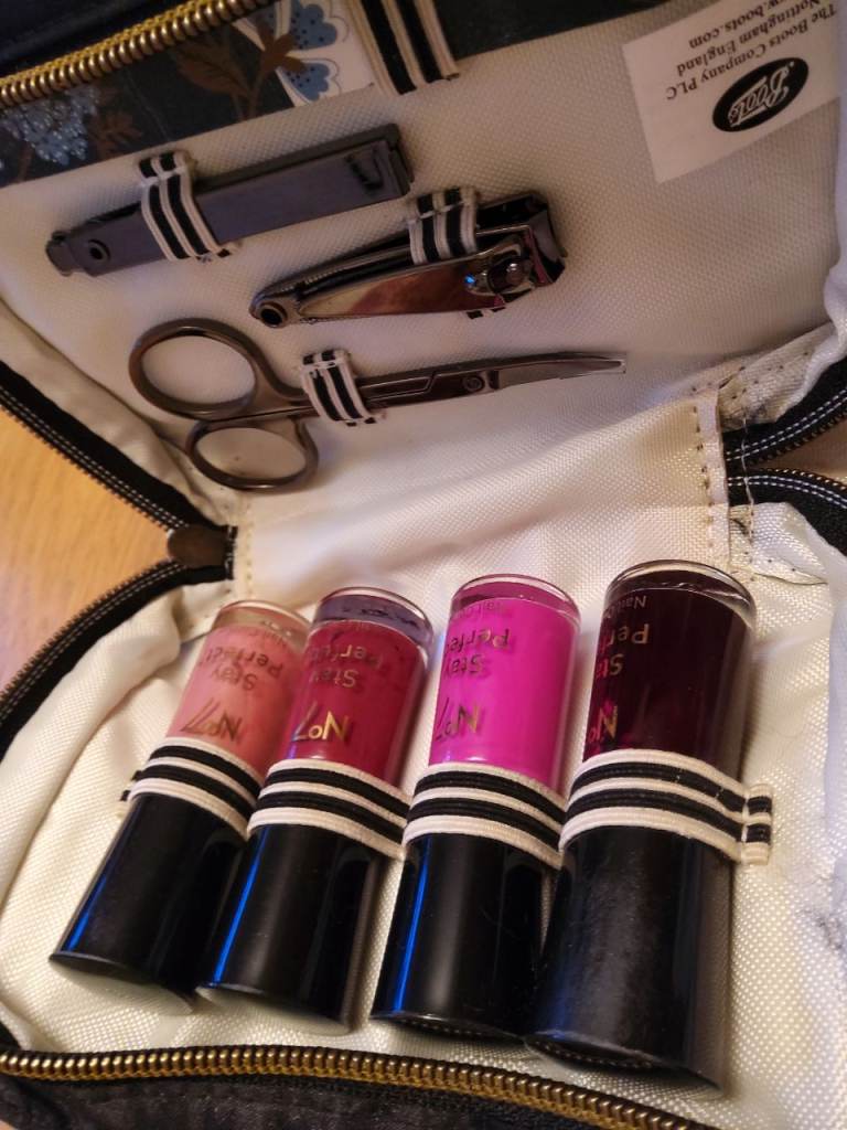 image for New Boots manicure case. 4 × 4ml polishes,  scissors,  clippers nail file zipped case