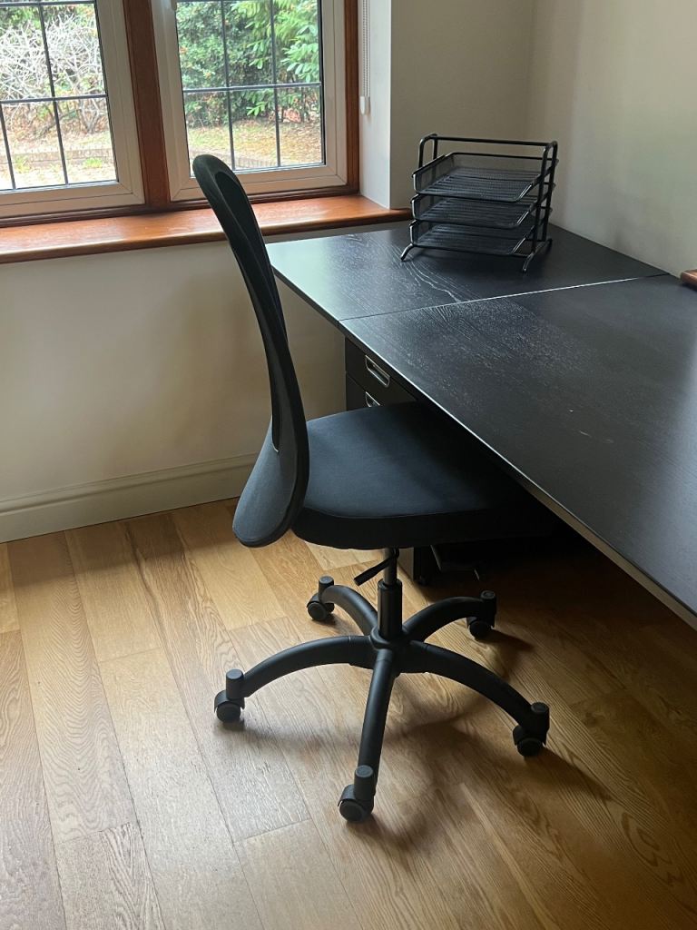 Black Office Chair with Wheels – Good Condition