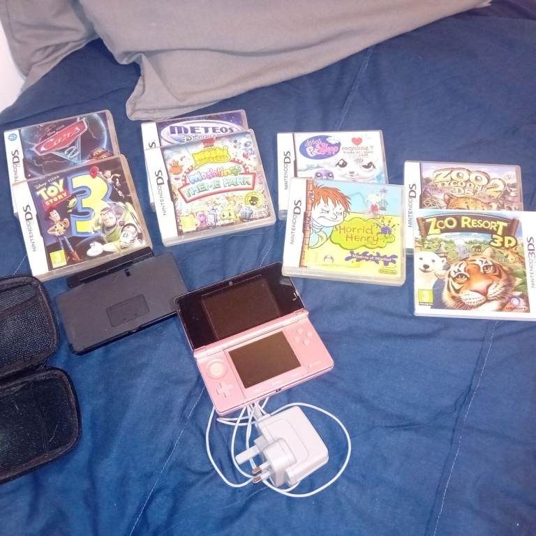 Nintendo 3DS Pink Console with Games and Cases – Good Condition