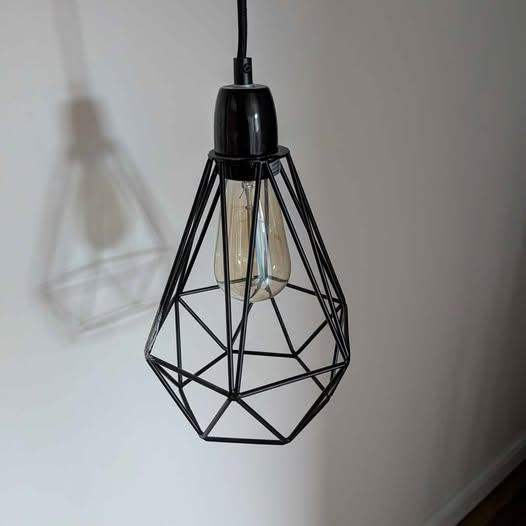 Pendant light with ambiance light bulb