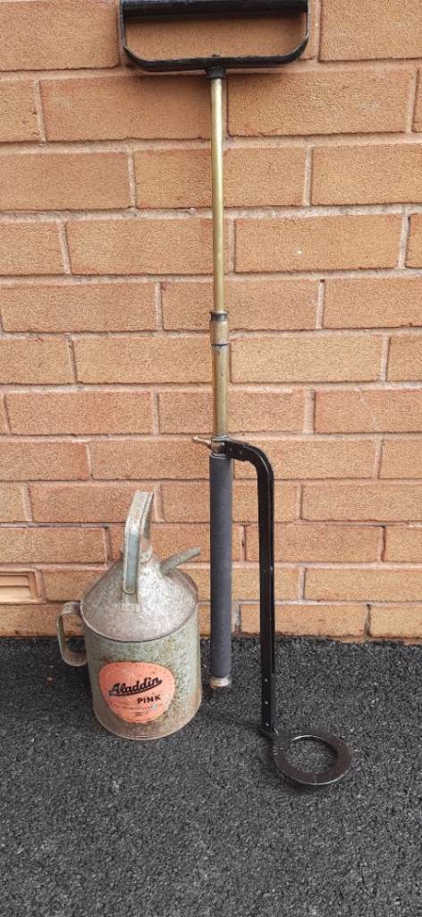 WW2 brass /steel stirrup pump + old pink parraffin can