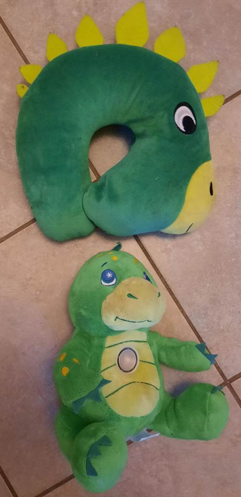 Dino neck pillow and flash light dino teddy.