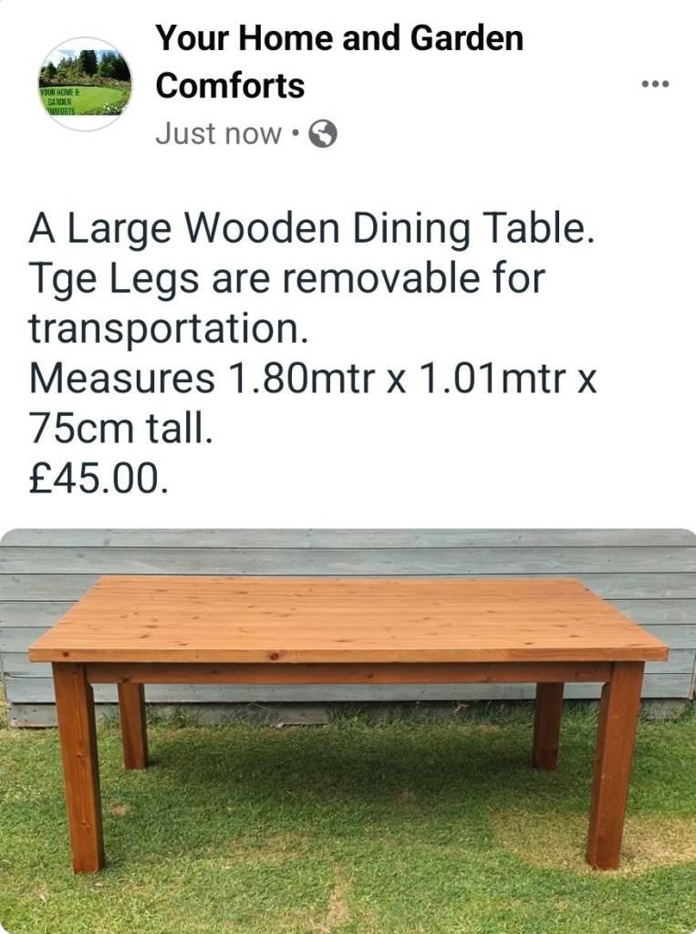 A Large Wooden Dining Table. 