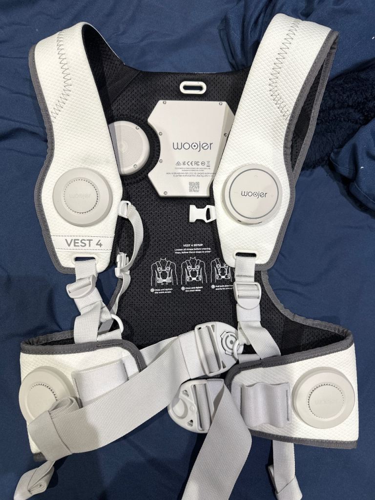Woojer vest 4 white, perfect condition, no box. Comes with charger, no cable, usb c