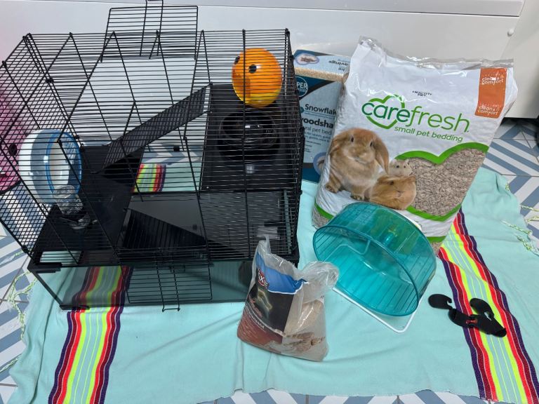 Hamster cage with accessories and bedding