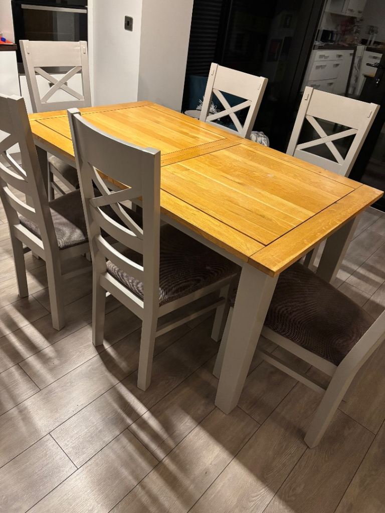 image for Wooden dining table and 6 chairs