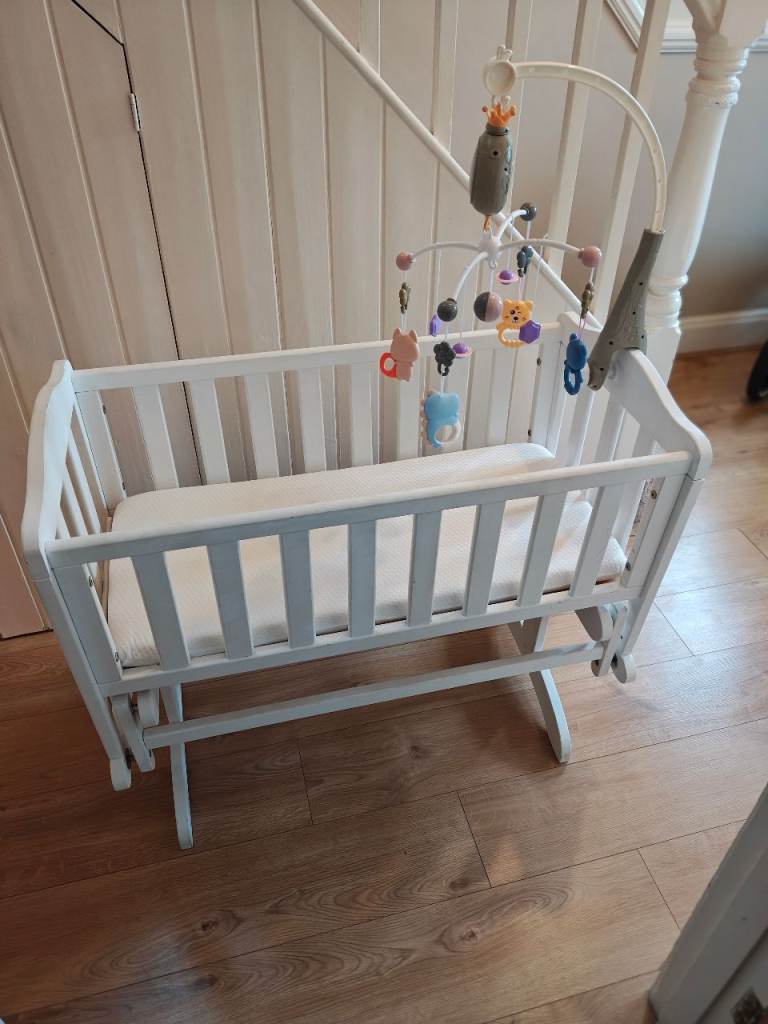 Gliding Baby Crib with Matress and Musical Mobile included