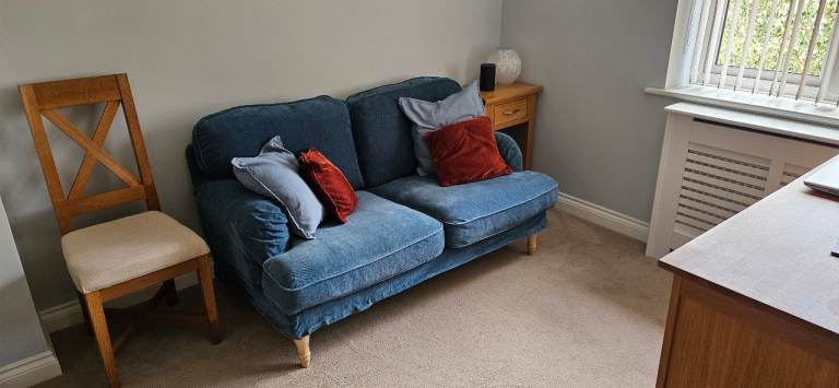 Comfy Blue Two-Seater Sofa – Good Condition