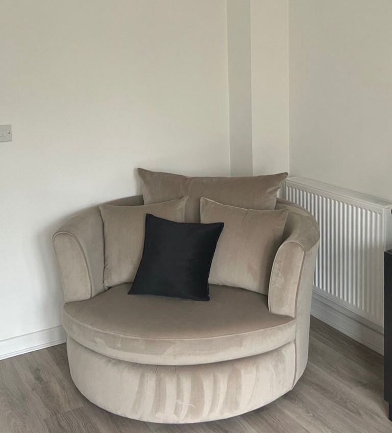 Swivel armchair and foot stool