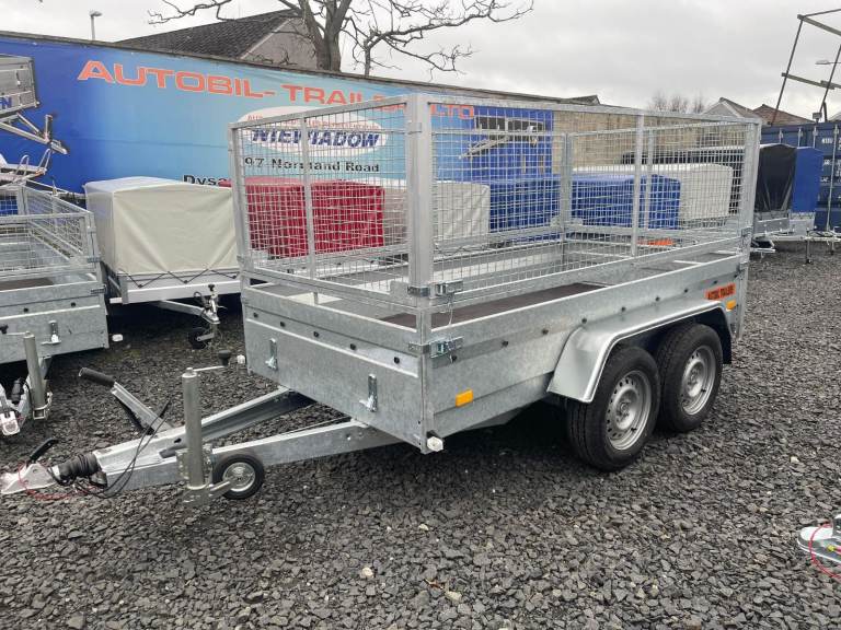 BRAND NEW 10FT X 5FT TWIN AXLE MASTER HEAVY DUTY TRAILER WITH 80CM MESH AND RAMPS 2700KG BRAKED