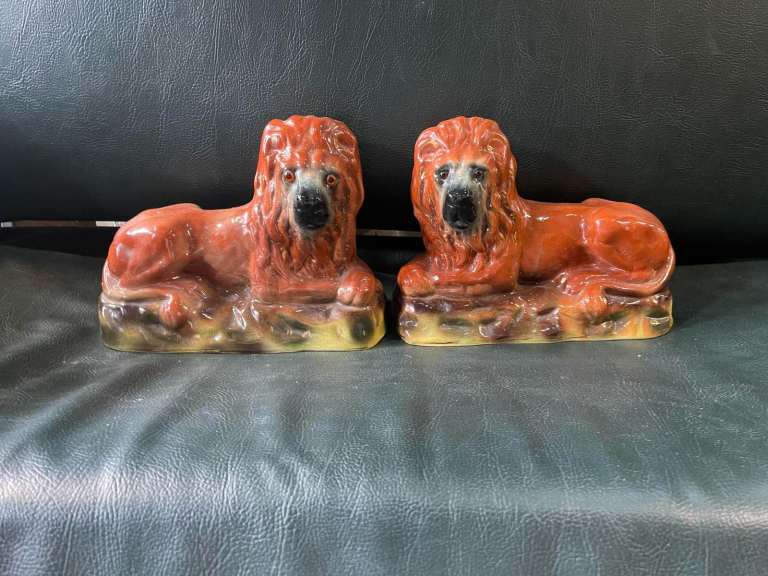 Large antique pair of Staffordshire lions 