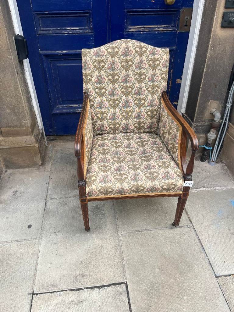 Antique Tub style Chair , good quality . On castor wheels . 