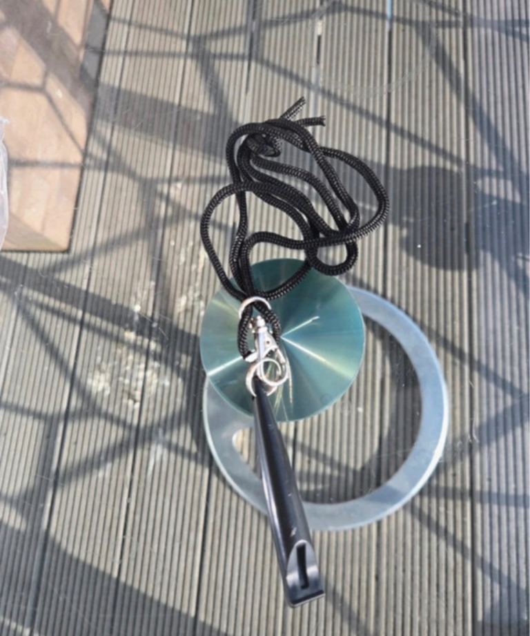 Brand new dog whistle with lanyard (in great condition)