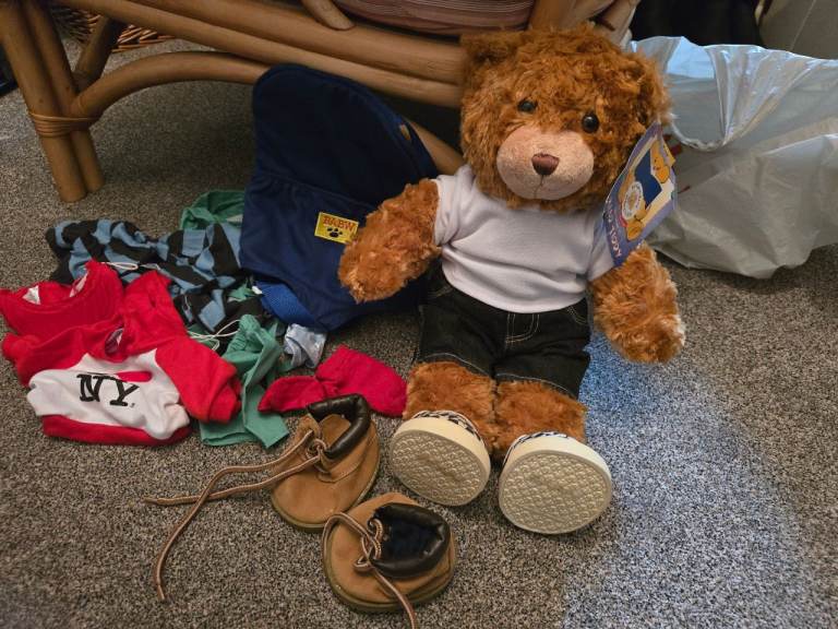 Build a bear teddy new with tag and clothes shoes bundle.