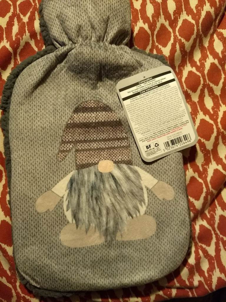 Hot water bottle in fleece cover. NEW