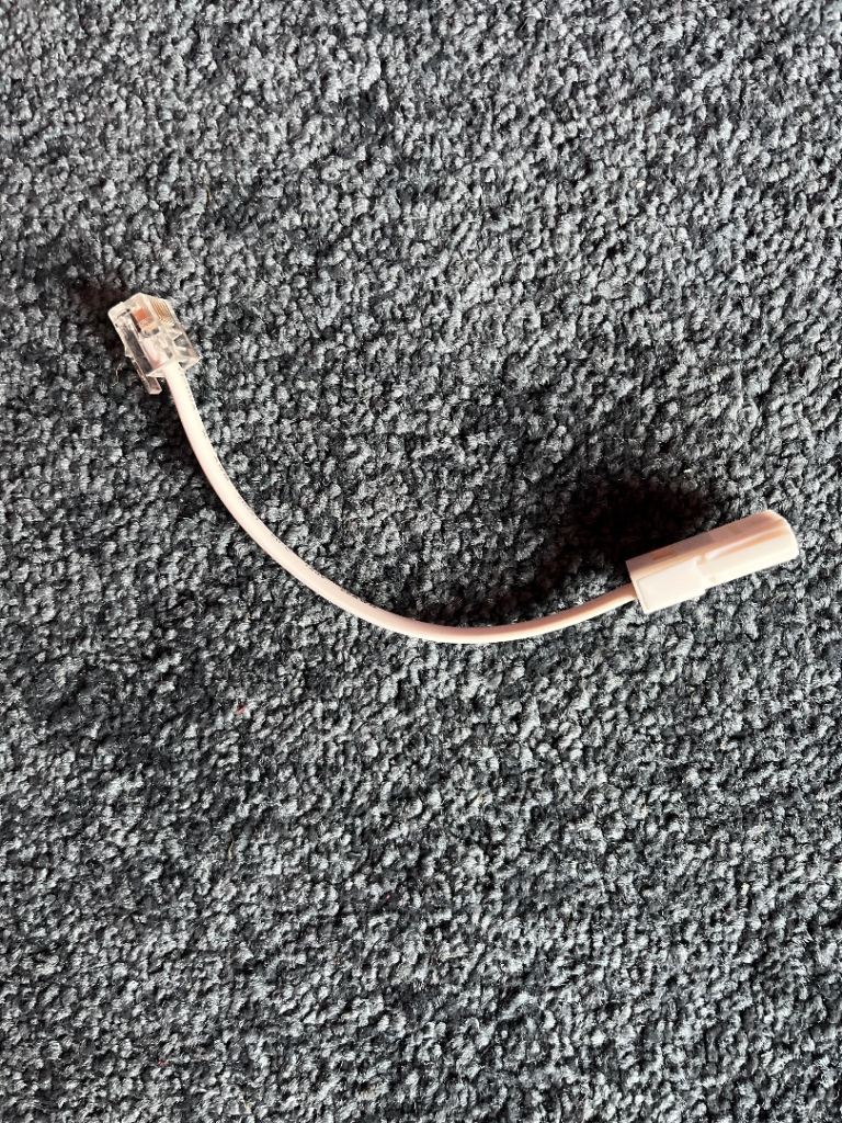 Landline telephone to modem cable