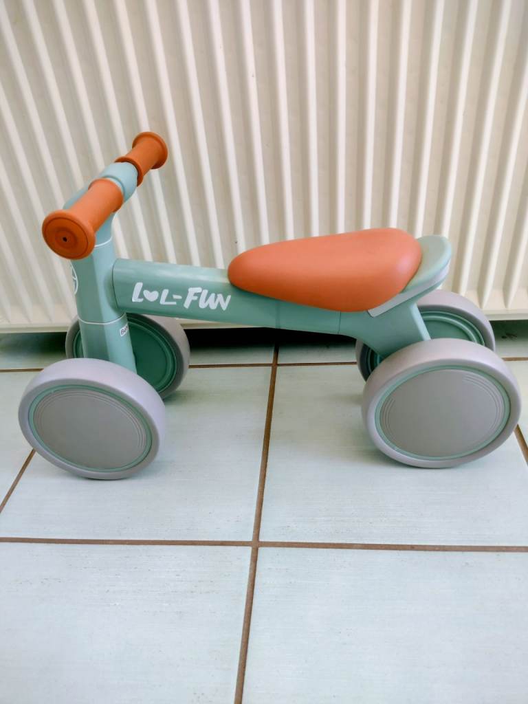 As New! LOL FUN Plastic Toddler 4 Wheel Ride on. Age 1-2 years, see the photos/details!