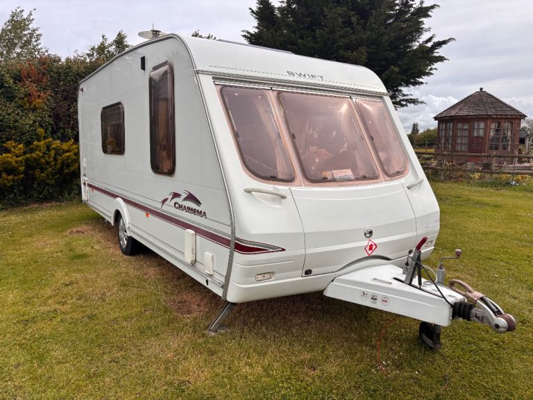 Swift charisma 4 birth caravan and two awnings and extras