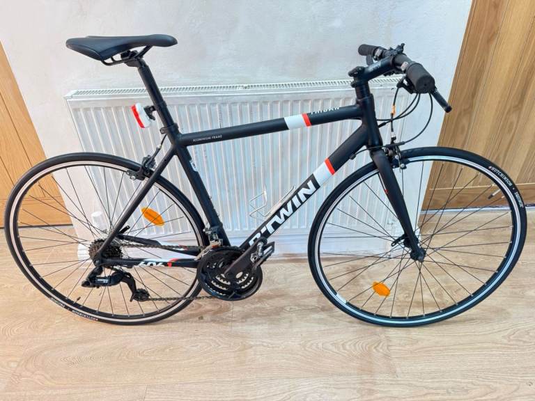 Btwin triban 500 hybrid bike in good condition All fully working 