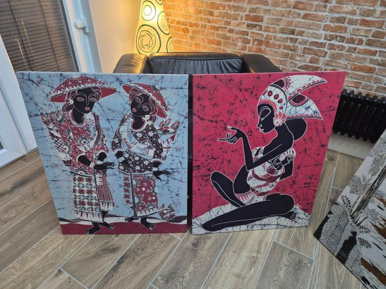 Four batik pictures on wooden frames