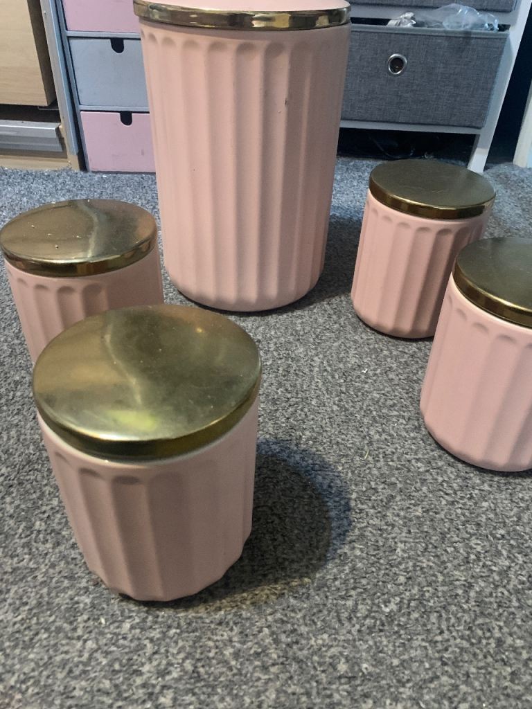 SET OF PINK POT CANISTERS WITH GOLD LIDS