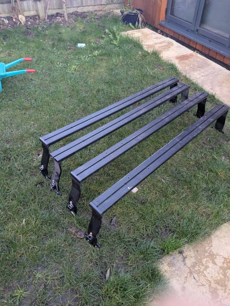 Four flat dog roof bars for disco 1 or 2