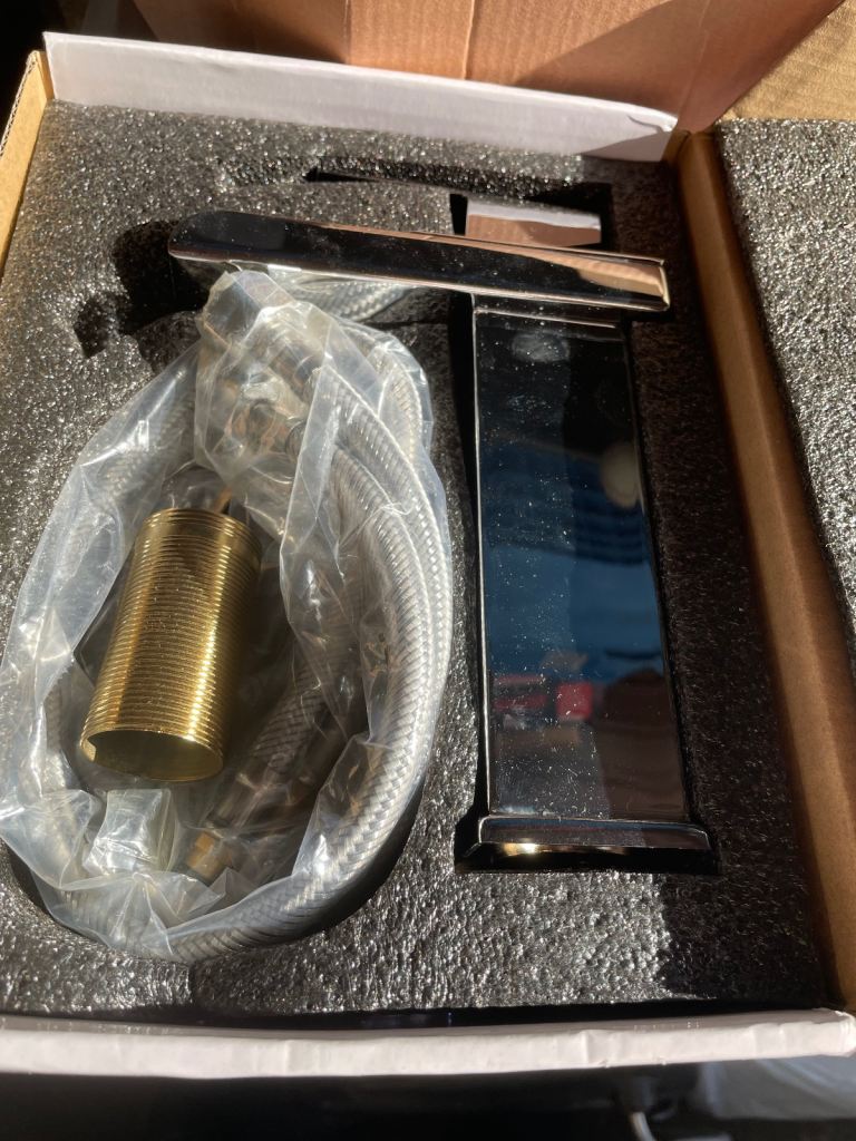 Water fall style basin mixer tap