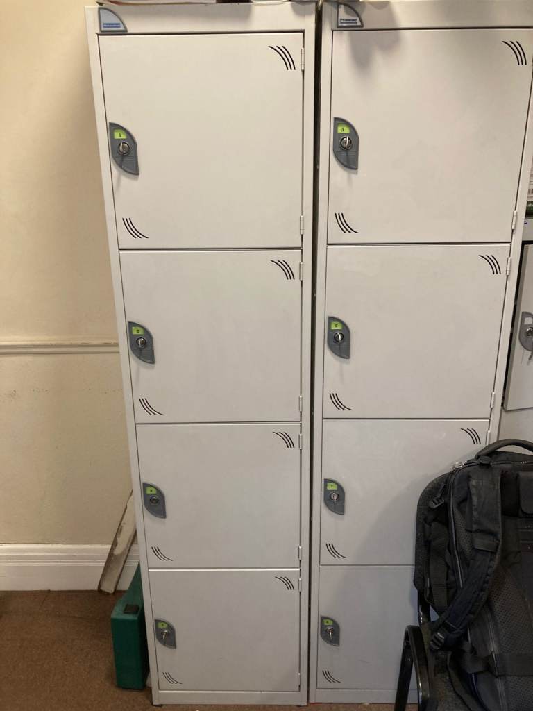 Storage lockers with 4 compartments each .