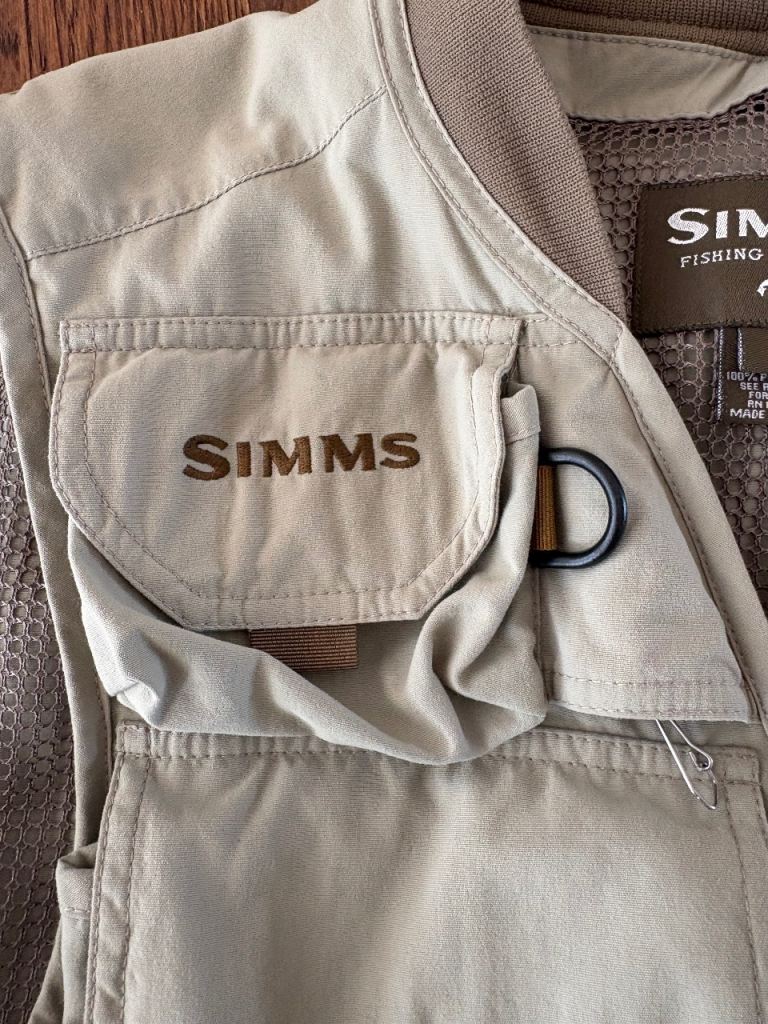 Simms and Musto fishing vests