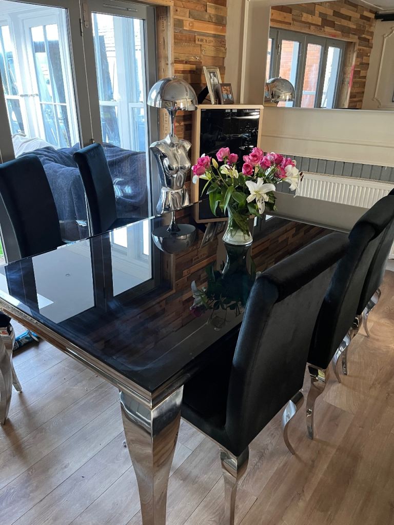 Louis black glass dining table and 6 velvet chairs 