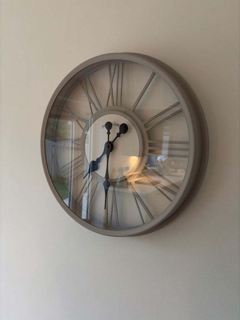 Large Grey Wall Clock with Roman Numerals – Good Condition