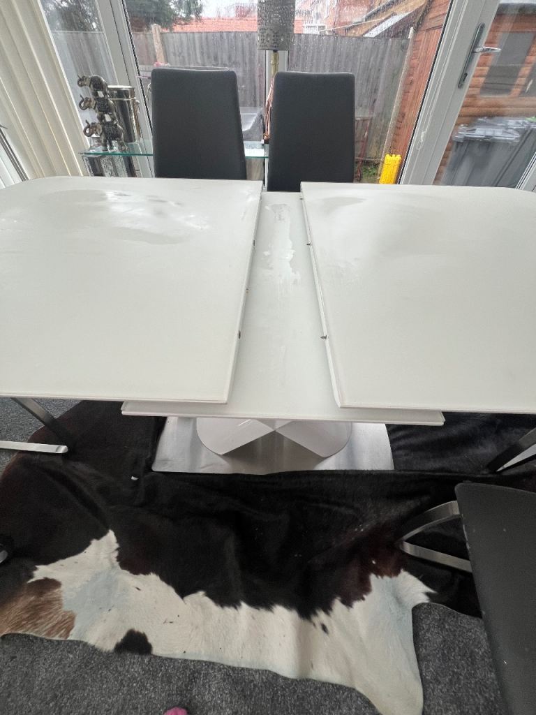 6 to 8 seater dining table and 6 chairs 