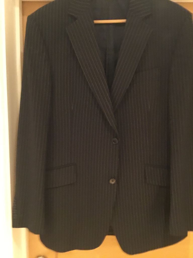 Smart dark pin stripe gents suit by Moss.