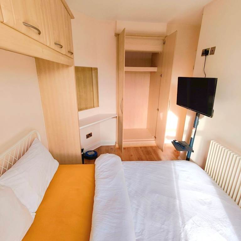 Cosy room with it's smart TV and your own fridge