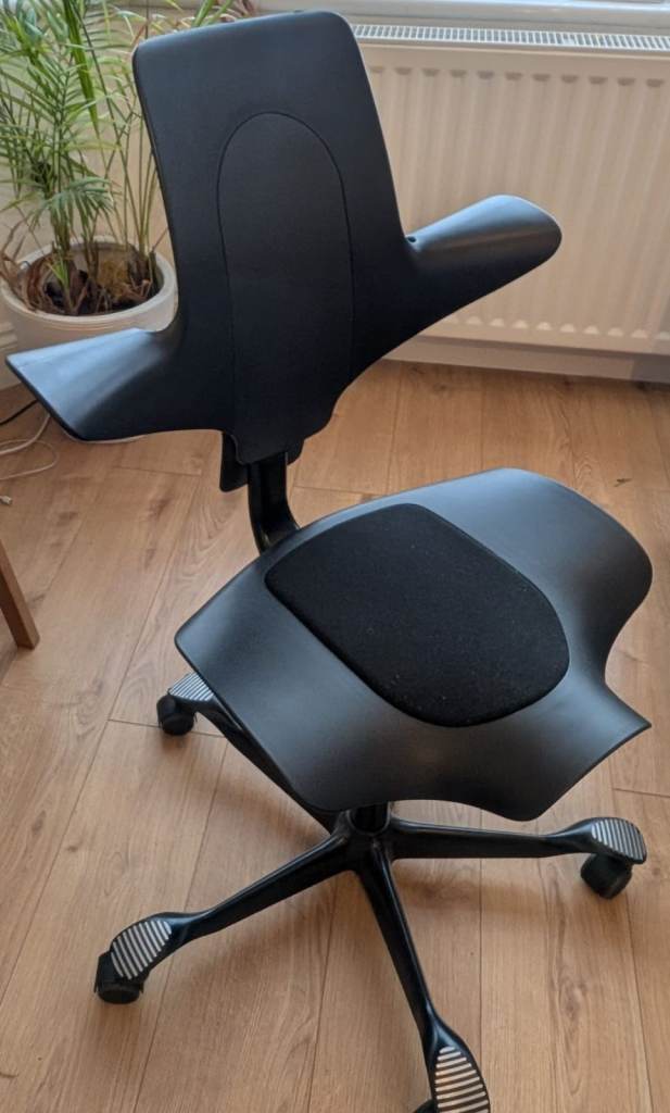 HAG Capisco Puls 8010 Office Chair - Black with Castors for hard floor