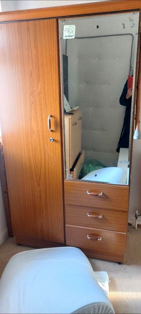 Vintage wooden wardrobe with a lock