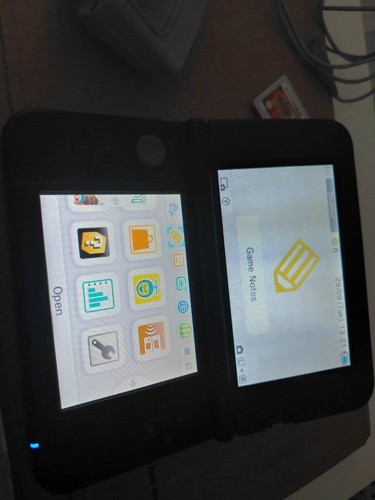 3DS XL silver with pokemon sun game