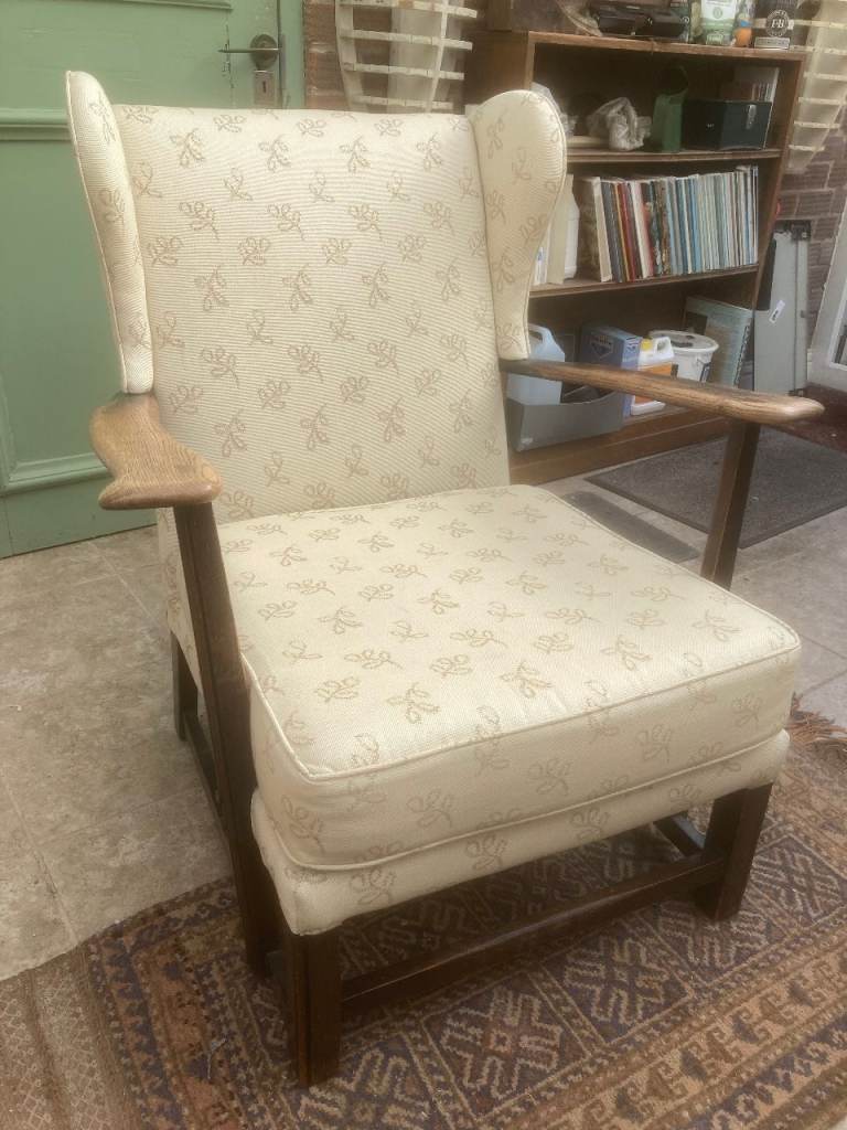 Vintage Ercol type wing back armchair