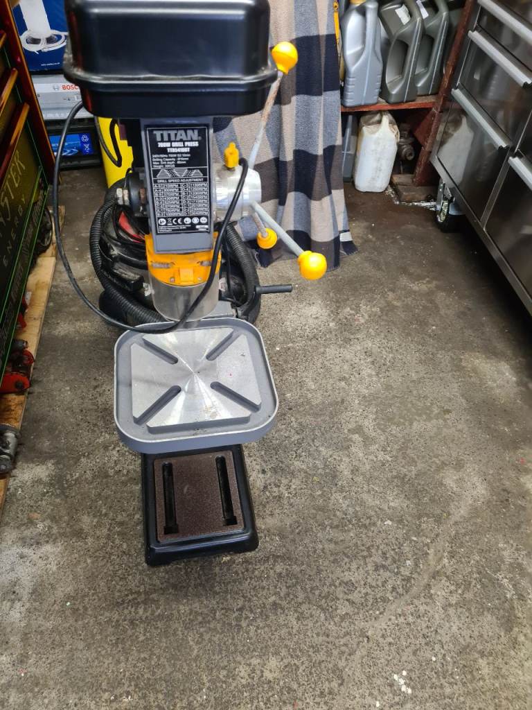 image for Titan pillar drill quite tall. Can be seen working. 