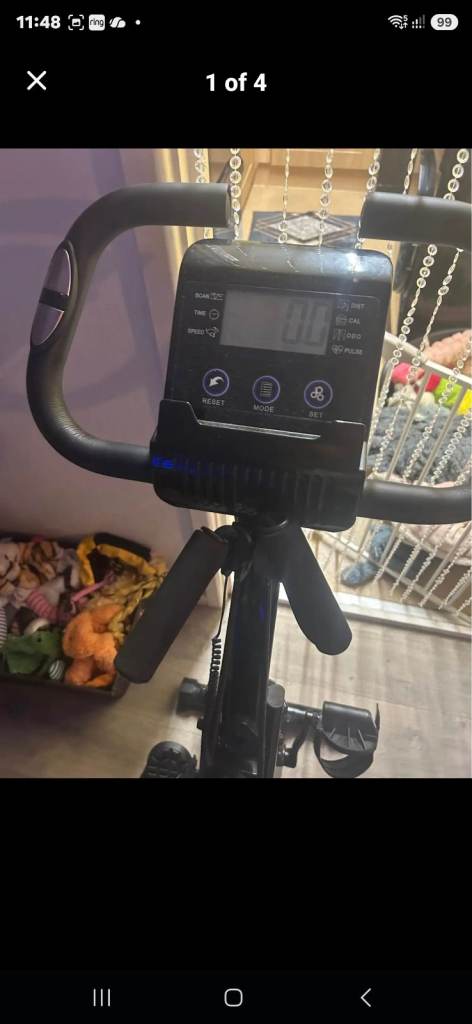 Exercise bike with added arm work out