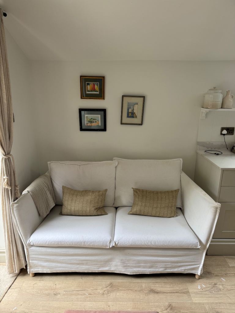 Two-Seater Sofa with Washable Cover – Good Condition