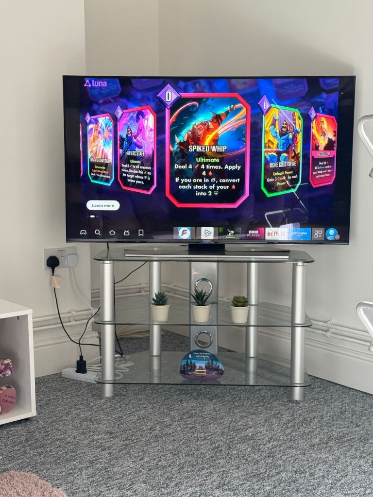 Samsung tv and glass stand 