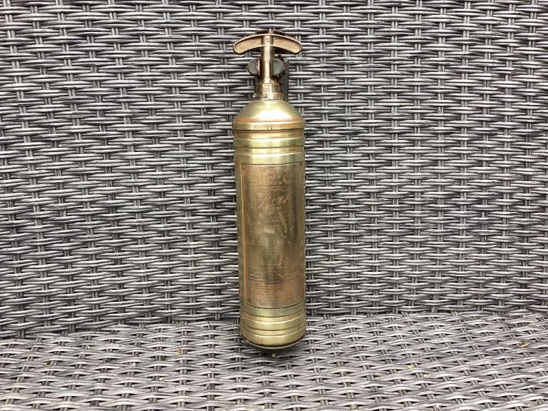 Old brass fire extinguisher 