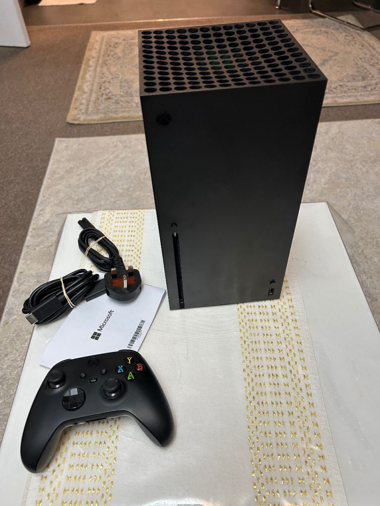 Xbox series x 1TB with charging unit and skim