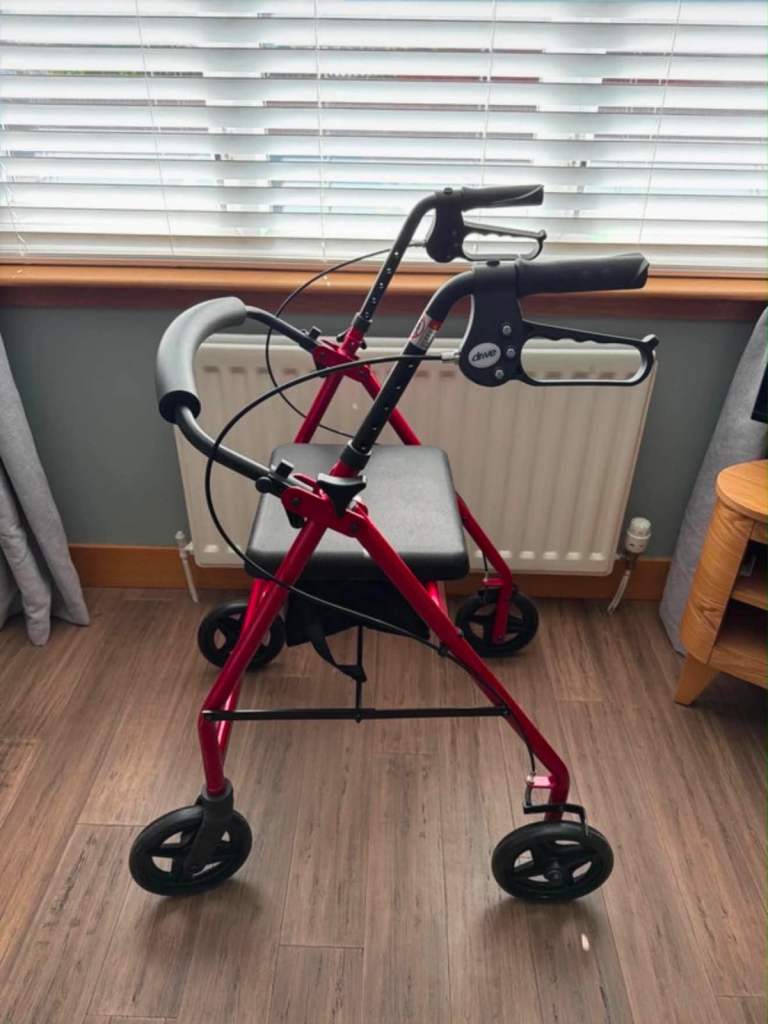 Red Mobility Walker with Seat – Good Condition