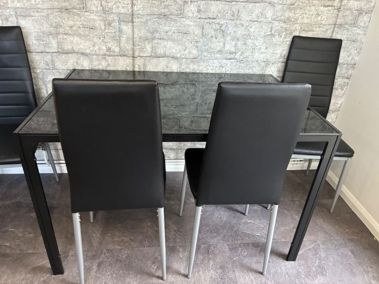 Black Glass Top Table & 7 Chairsp