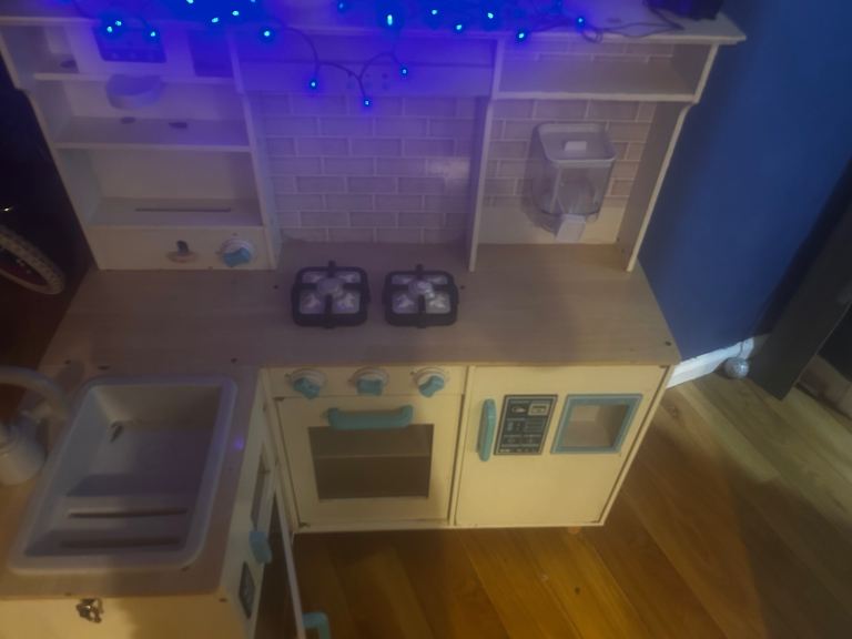Corner wooden play kitchen 